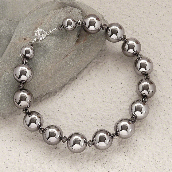 Elise gunmetal and amethyst shadow crystal necklace by Elli